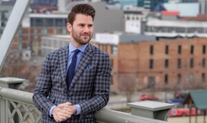 Nashville clothier Stephen Richards poses on a downtown rooftop.