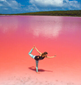 Jess Hudson stretches in the pink waters in Western Australia